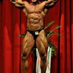Pavan Shetty Double Biceps Pose