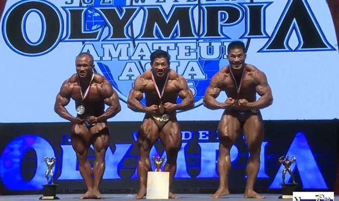 Robi Posing Silver Medal at Amateur Mr Olympia