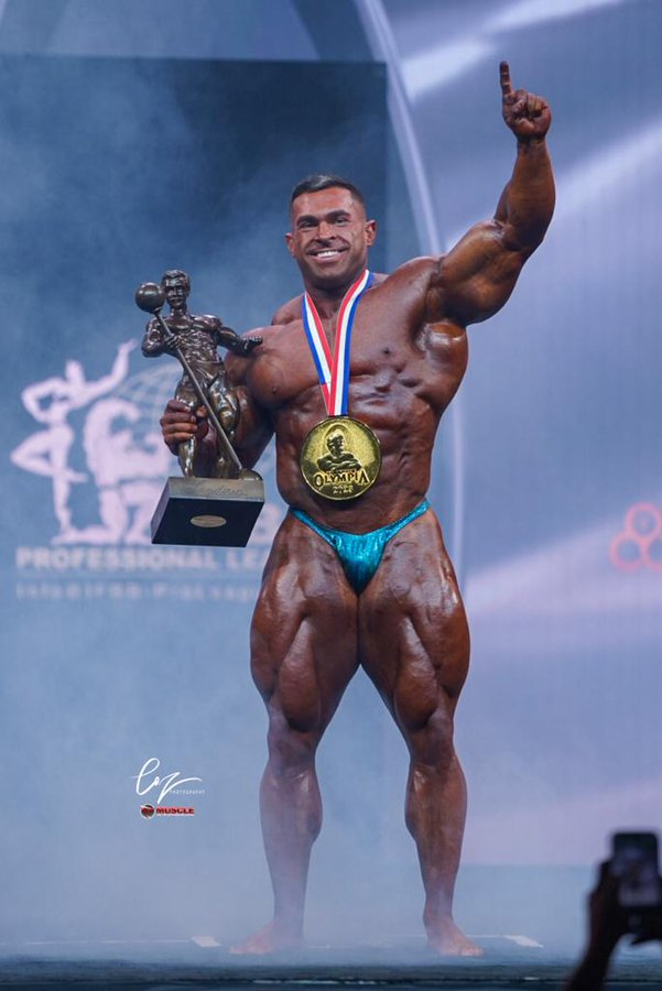 Mr. Olympia 2023: Derek Lunsford Overcomes Injury and Defeats Hadi Choopan  to Claim Mr. Olympia Title - IBB - Indian Bodybuilding